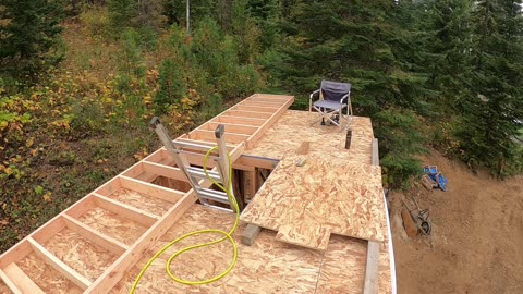 Building the second floor of the cabin