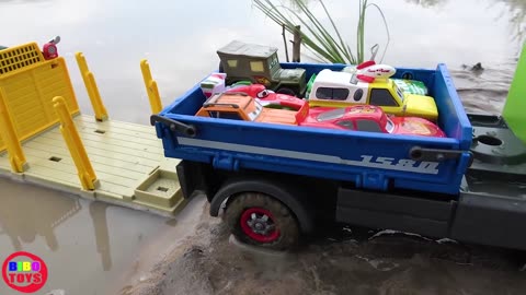 Truck crossing River with Disney Pixar Cars Toys Lightning Mcqueen and Friends