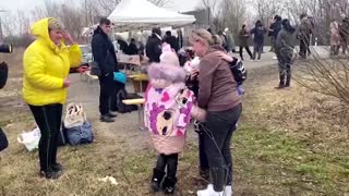 Mother reunites with children at Ukraine border