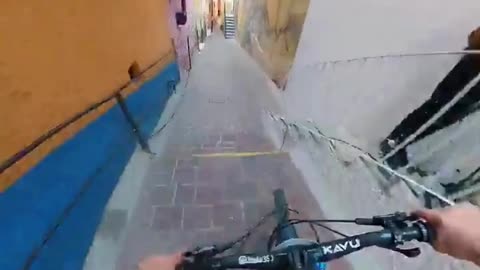 Biker Races Through Narrow Alleyway at Insane Speed 🚴💨🏁