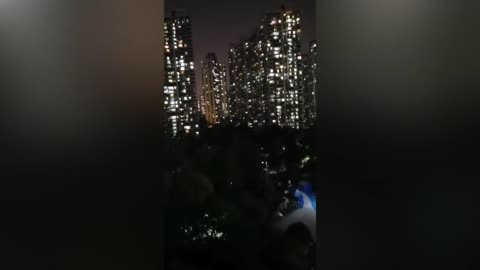 Creepy: Locked Down Chinese SCREAM From High Rise Windows