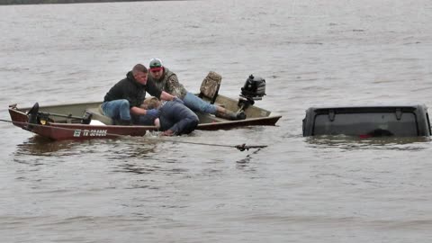 Missing woman found alive inside submerged vehicle