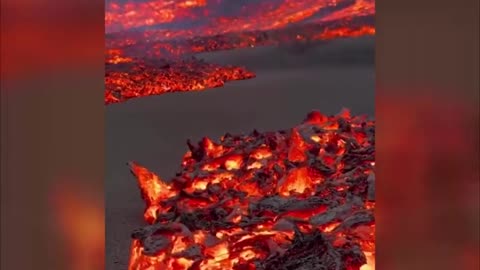 Awe-inspiring footage showing lava flowing on the Spanish island of La Palma.