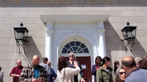 Daniel Richard speaks to supporters in front of New Hampshire Supreme Court on 4-21-2022
