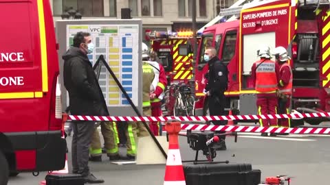 Flames rage from building near Paris opera