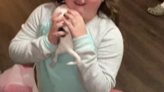 Sisters' Adorable Puppy Surprise