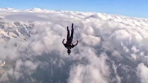 Doing pull-ups on helicopter before skydiving