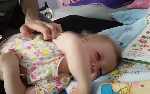 Baby's Hilarious Reaction to Getting Tickled