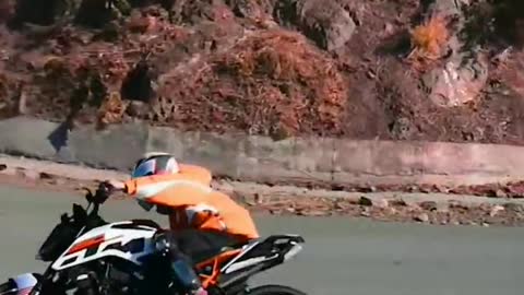 Top speed biker loves to ride over hills