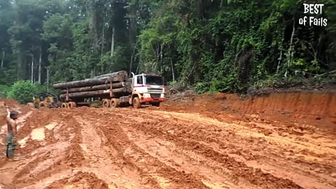 Extremely Dangerous Logging Truck Drivers Skills ! Truck Crossing River And Climbing Muddy Road