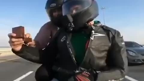 Marriage proposal on motorcycle