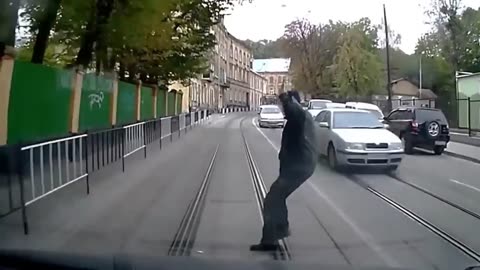 Man nearly gets Splatted by City Tram Train