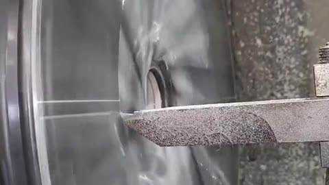 Automobile wheel hub grinding