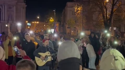 Ukrainians showing strength by singing together during War