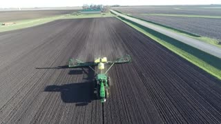 John Deere Tractor Plowing Field Clear Day