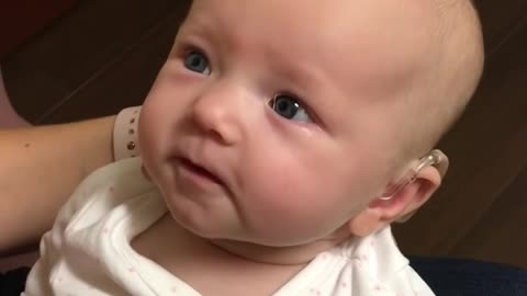 My baby hears me for the first time and is almost moved to tears!