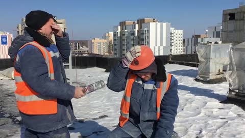 Crazy Russians are hitting each other with bottle of vodka