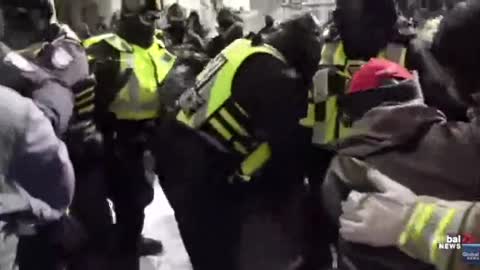Ottawa police beat unarmed, defenseless protester (Feb. 18, 2022)