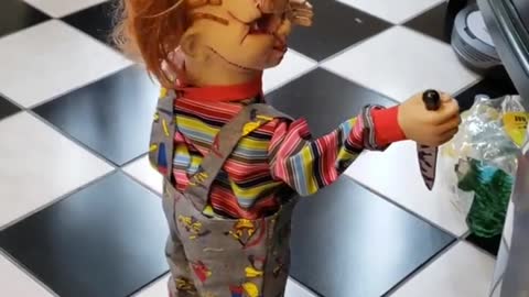 Scary Chucky Doll Rides Around On A Robot Vacuum