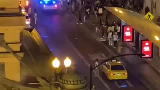 Chaotic Scene Unfolds in Downtown Chicago as Teenagers Vandalize Cars and Gunfire Erupts