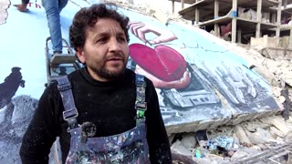 Syrian artists paint 'strokes of hope' in quake-hit Jandaris