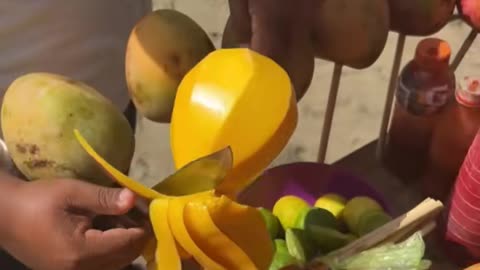 Fresh mangoes on the beach in