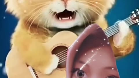 Orange Kitten Learns to Play Guitar and Sing