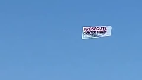Banner reading 'Prosecute Hunter Biden' seen flying over his father's beach house in Delaware