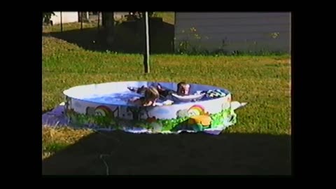 VHS Tape 6 video18 July 1996 Trailer park play, bike, bus stop and dad play