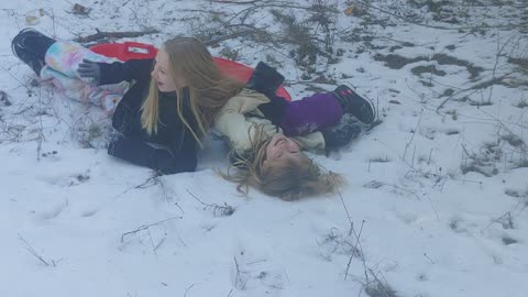 Girls use small amount of snow