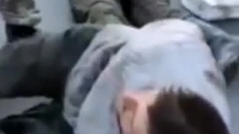 Ukraine soldiers killing Russian POWs WAR CRIMES