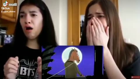 Two girls crying