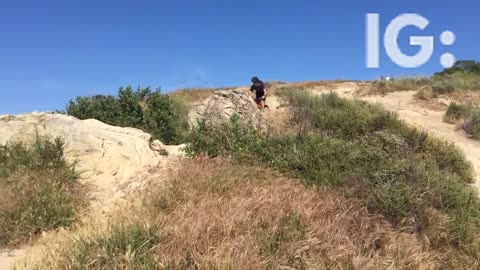 Orange bike mountain bike jump fail