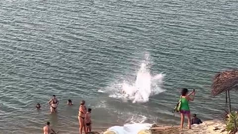 Man Surfs Down Waterslide and Somersaults Into Water || ViralHog