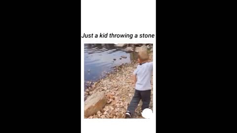 Just a kid throwing a stone