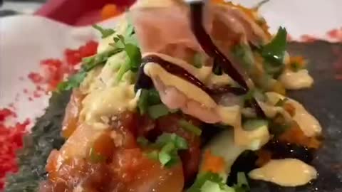 Hot Cheetos Poke Burrito. Who else agree with this audio From Poki Tomik in Glendale