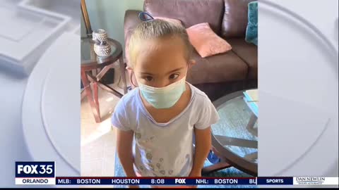 Pige med Downs Syndrom, får bundet en maske på hovedet med nylonreb (USA)