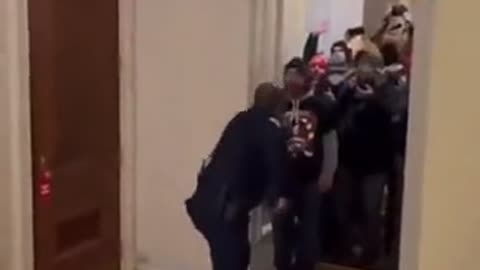 Bad Actor Cop Allows Breach at Capitol Building