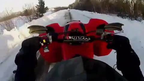 Red atv wheelie ice slide