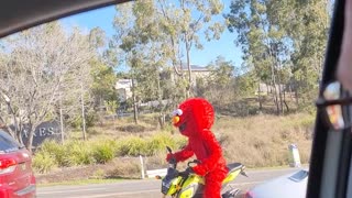 Elmo on a Motorbike