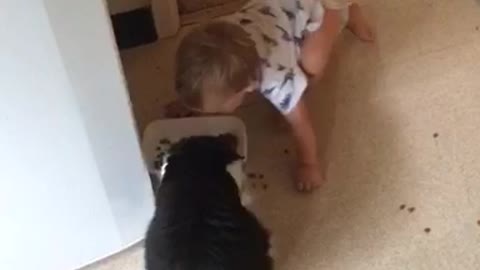 Baby hilariously imitates cat's eating habits