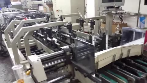 Automatic Box Folding Machine in a Vietnam Packaging Factory