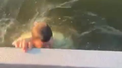 Guy Falls Off Boat While Fishing