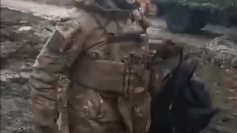 Ukrainians Evacuating a Wounded Soldier