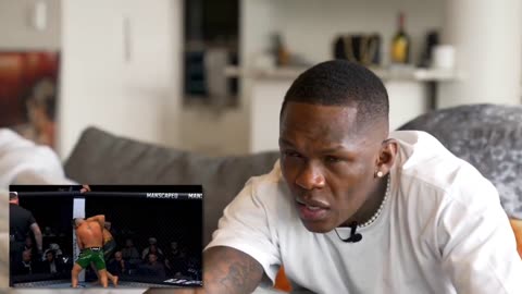 Israel Adesanya reacts to Islam Makhachev's knockout of Alexander Volkanovski at UFC 294