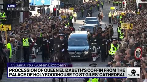 King Charles III leads the processional for the queen into St. Giles’ Cathedral