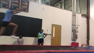 Girl backflip blue shirt fail friends scream