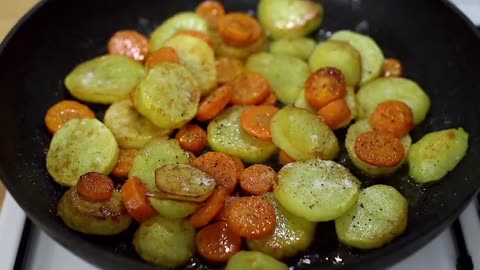 Delicious recipe for fried potatoes with carrots. Simple and light dinner!