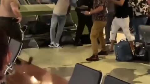 Miami International Airport passengers brawl