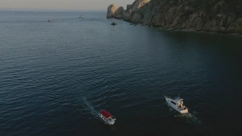 Ships sailing through the sea around an archipelago